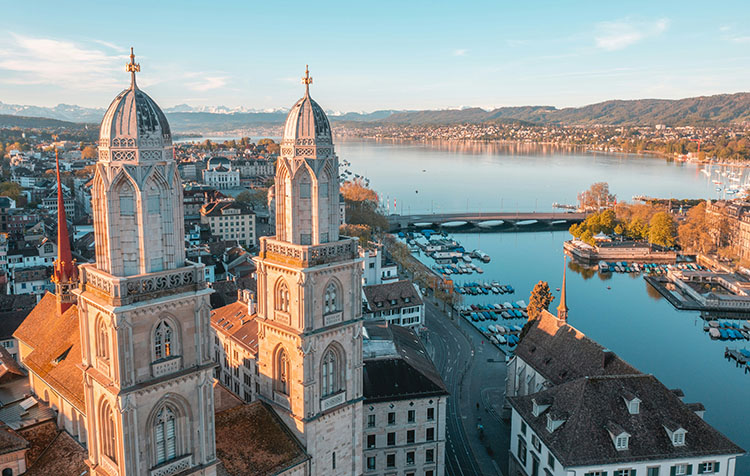 Zurich from above with a view of the lake and the Grossmünster