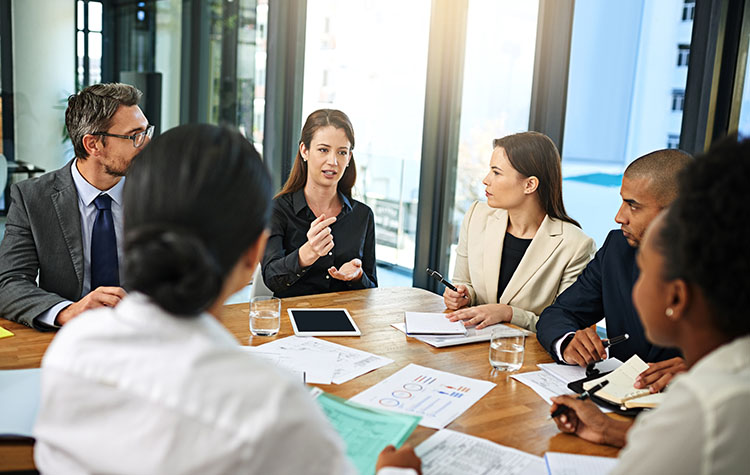 A meeting with several employees.